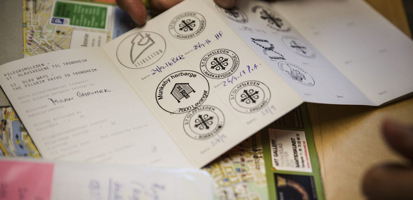 Pilgrim passport with various stamps. Photo